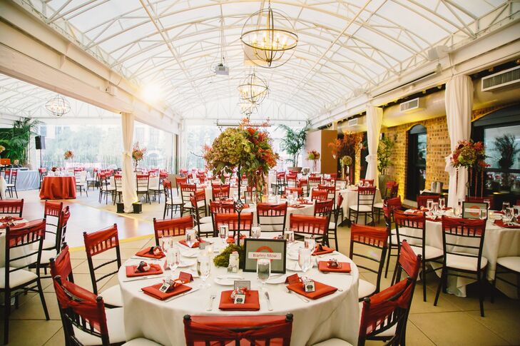 In keeping with the theme of England meets Texas, the couple served British appetizers during the cocktail hour and a traditional Texas meal. The couple named each table after their favorite pubs, and seated guests at their most familiar pub.