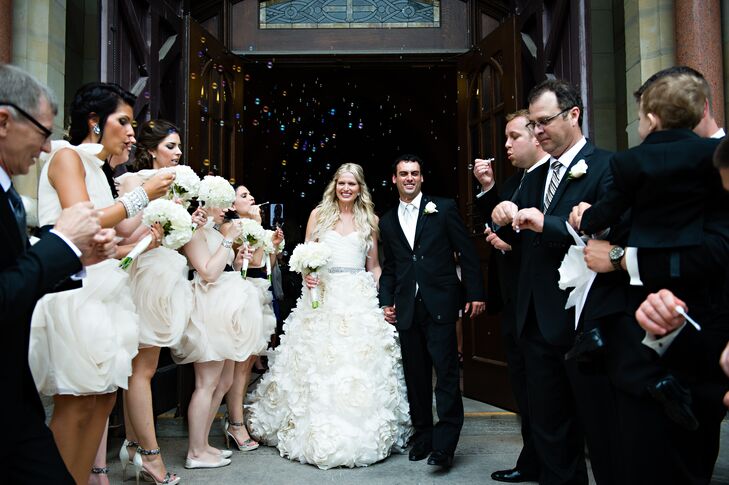 Fourteen years after they first met as teenagers, Ania Bialecki (29 and a chemical engineer) and Ken Lisabeth (31 and a tool and die maker) invited 15