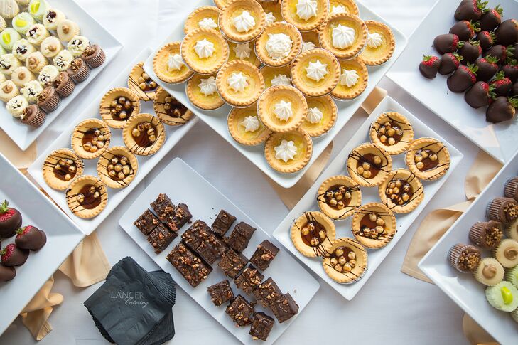 Guests could choose sweets from a dessert bar. As a fun treat, the couple also arranged for a french fry bar during their reception.