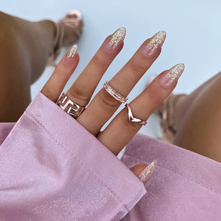 Neutral press on nails with sparkly tips. 