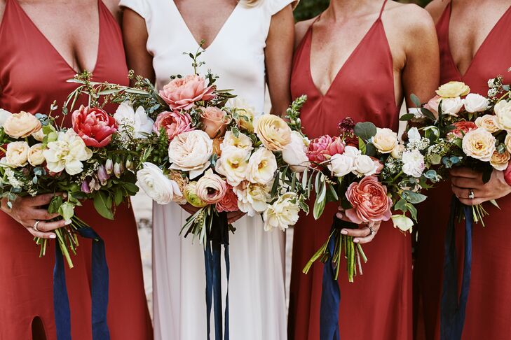 Romantic Full Coral Ranunculus and Eucalyptus Bouquets