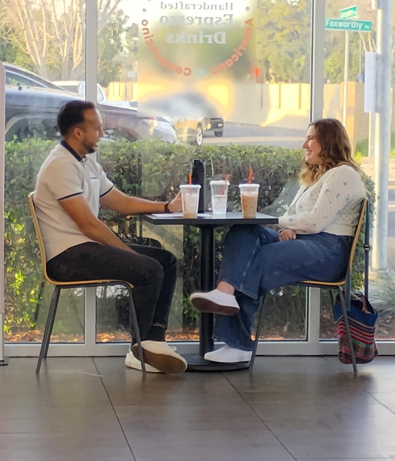 Meeting for coffee to discuss what their "intentional friendship" might look like.