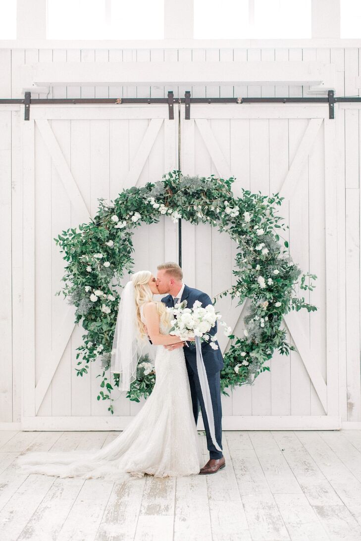 Traditional Couple in Barn with Oversize Wreath Backdrop