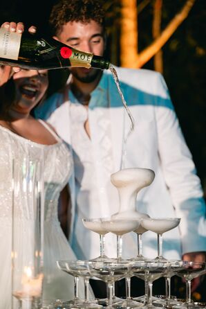 Bride Pouring Moët & Chandon Champagne on Champagne Tower