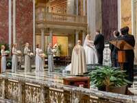 priest officiating traditional Catholic wedding 