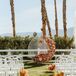 Circular Floral Structure at Ceremony Altar With Bright Flowers at Desert Wedding