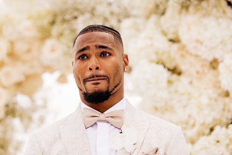 Jonathan Owens crying during wedding ceremony