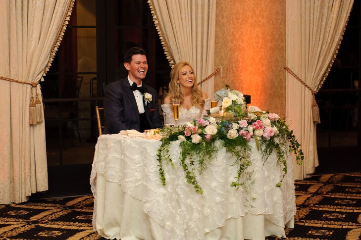 Peter had a single ivory rose boutonniere pinned to the lapel of his classic black tuxedo, which he wore throughout the day. Peter paired his formal look with a black bow tie on top of his white collared dress shirt.