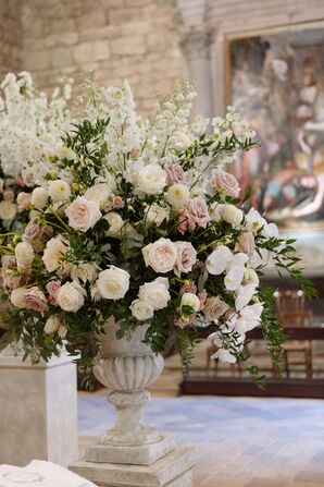 White-and-Pink Floral Arrangement in Stone Vase, Catholic Church in Italy