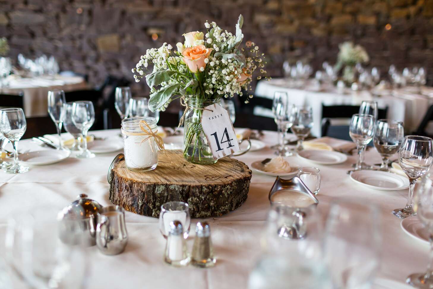 DIY Wooden Slab Centerpieces With Jars and Flowers