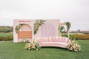 Pink Seating Chart Backdrop Wall and Pink Velvet Couch