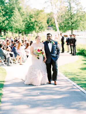 Bride in Blush Dress and Groom During Recessional