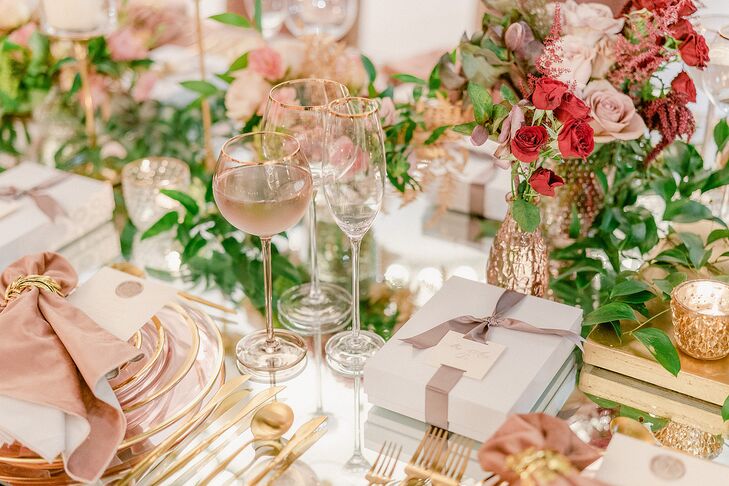 “At each place setting, we gifted guests a gold frame with a note inside encouraging them to fill it with pictures from the photo booth,” Diana says.