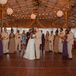 Newlywed First Dance Surrounded by Wedding Party and Family
