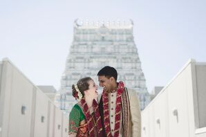 Couple in Front of Temple at Interfaith Wedding
