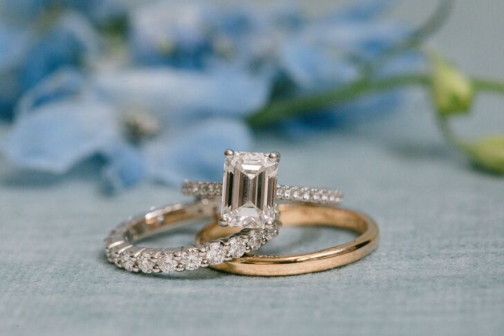 An Emerald-Cut Engagement Ring, A Multi-Diamond Band and Gold Wedding Band