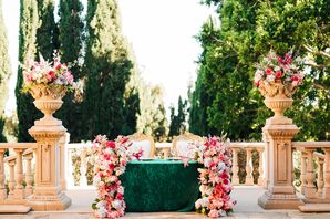 Pink-and-Green Sweetheart Table With Spilling Flowers at Estate