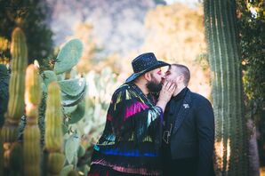 Glamorous Same-Sex Couple with Colorful Tassel Jacket and Sparkly Hat