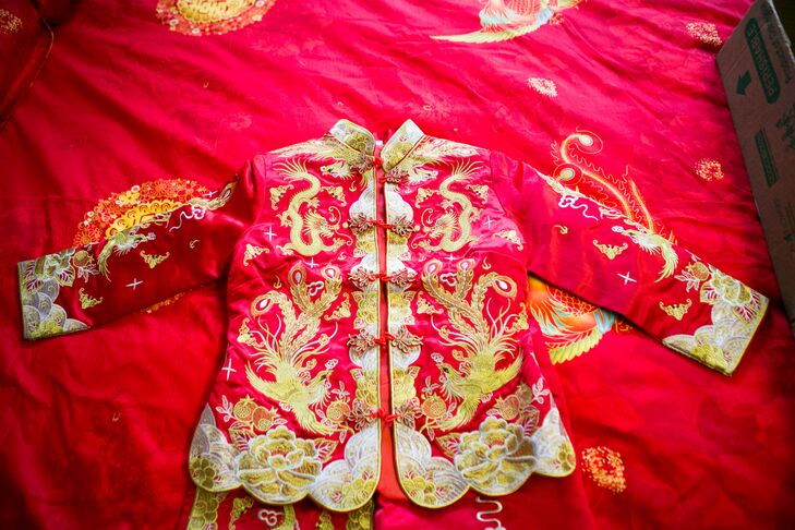 LeiLei had three outfit changes throughout the evening. She kicked off the evening in her elegant lace, mermaid gown, wearing it for the first dance, cake cutting and toasts. She then transitioned to a Chinese qipao for toasts with each table, followed by a golden Cambodian ensemble to end the evening.