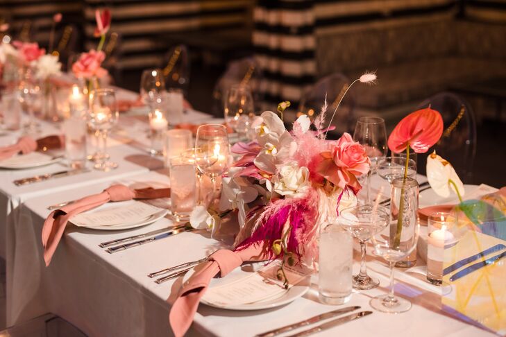Long Tables With White Linens and Pink Floral Centerpieces and Other Pink Details