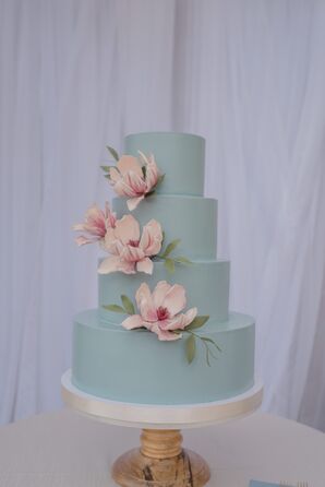 Four-Tier Blue Wedding Cake With Pink Flowers