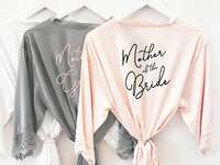Satin robe with lace sleeve details and 'Mother of the Bride' on back in script