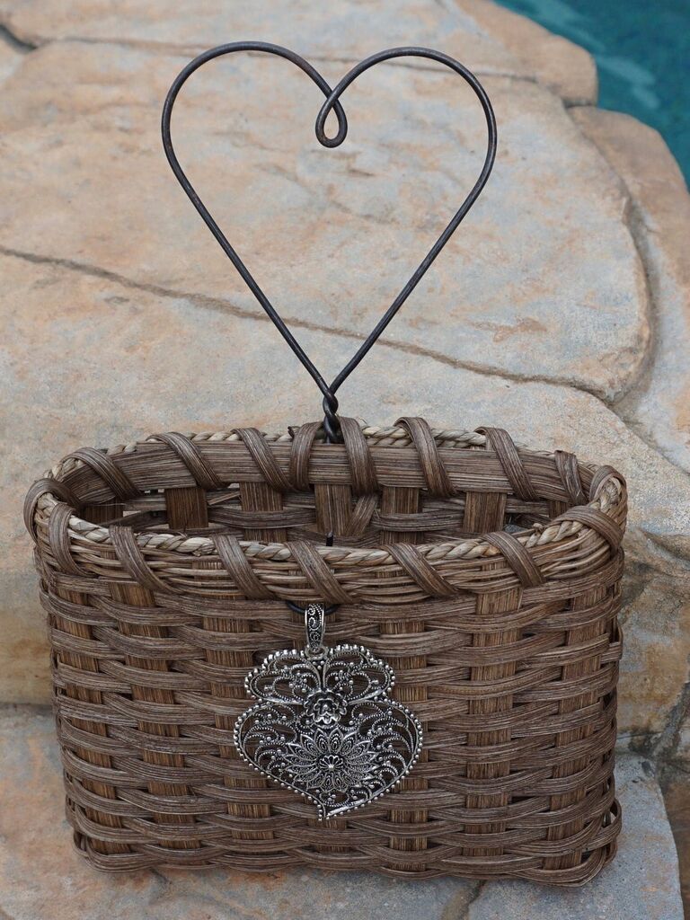 woven flower girl basket with metal heart handle
