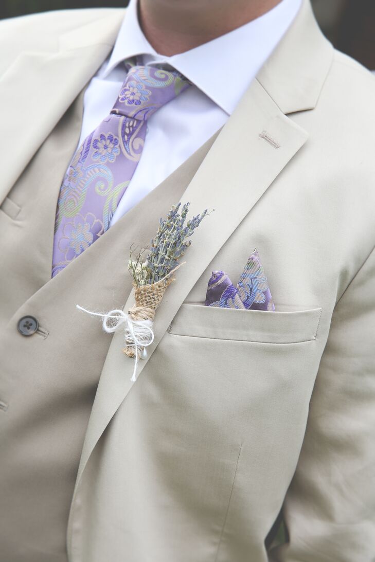 Joel wore a sophisticated beige three-piece suit with a patterned, lavender tie and matching pocket square. His boutonniere was a small basket of lavender to match the color scheme and bridesmaid bouquets.