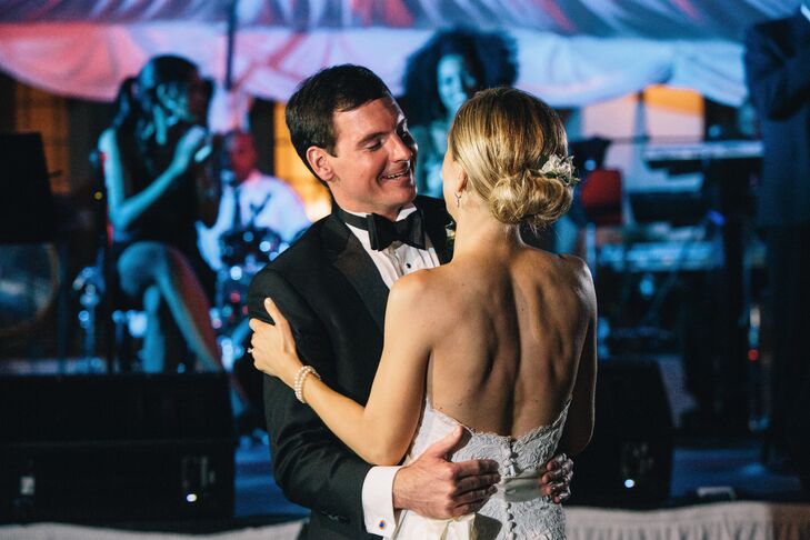 The newlyweds danced to L.O.V.E. by Nat King Cole. Matthew and I listened to several options, narrowed it down to about five and did a few practice dances to see which one fit us best, the bride recalls.