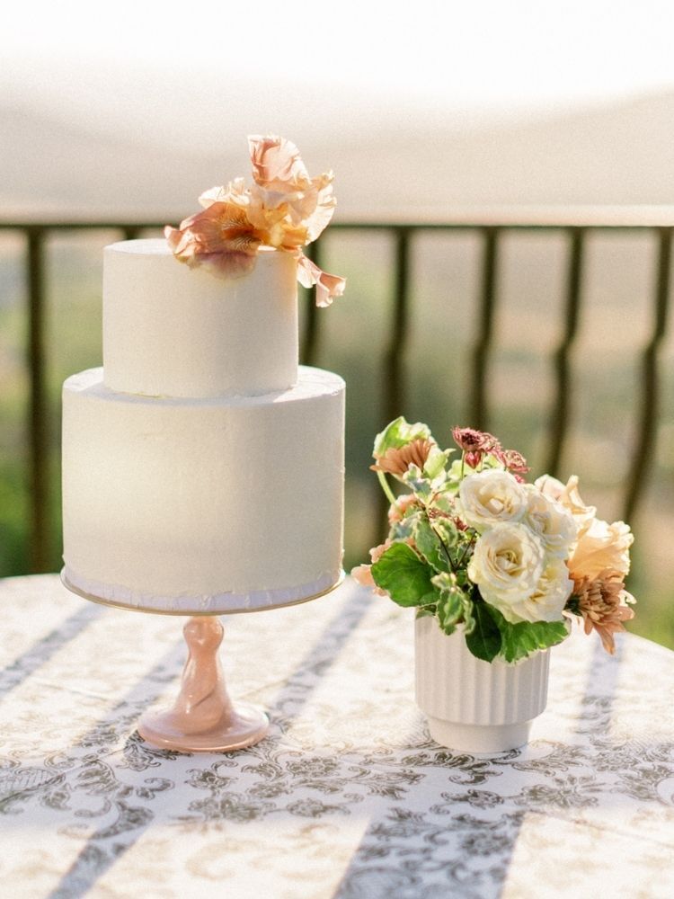 two-tier white wedding cake for summer wedding