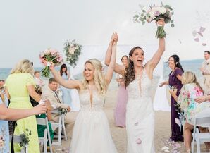 Brides Cheering During Recessional at Beach Ceremony at Bay Harbor Village Hotel in Petoskey, Michigan