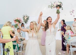 Not only did Leighanne and Samantha chose a June wedding so that the weather would be perfect for their beach wedding at Bay Harbor Village Hotel in P