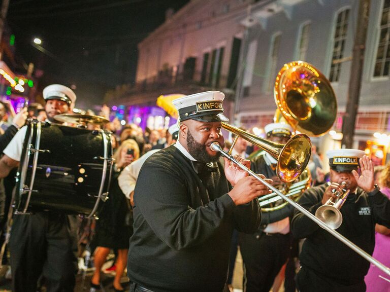 Mardi Gras-inspired musical parade at wedding reception