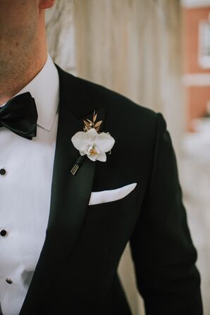 Formal Orchid Boutonniere and Black Tuxedo