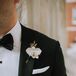 Formal Orchid Boutonniere and Black Tuxedo