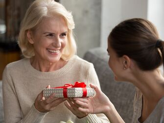 mother-in-law receiving birthday gift birthday card messages