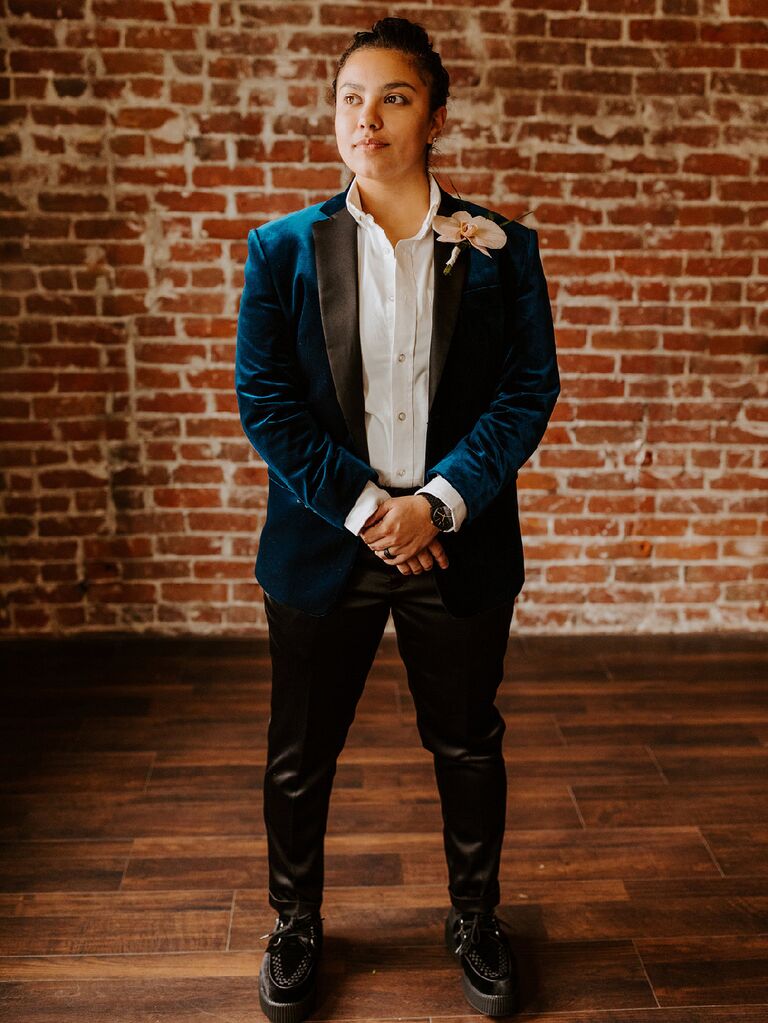 Bride wearing dark blue velvet suit at celestial wedding