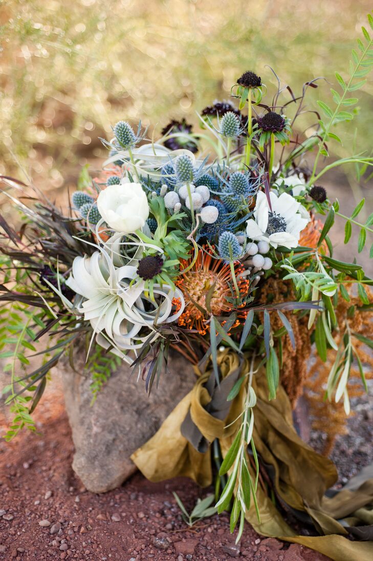 "I wanted something that looked wild. Not something super-fancy, because that's just not me," Christa says. "My florist, Interior Gardens, created the most beautiful boho bouquet, which spoke to who I am: free-spirited."
