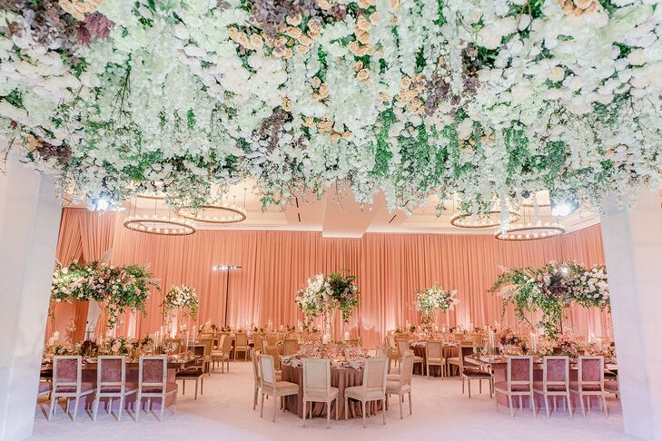 Wedding Reception With Draping and Hanging Flower Installation