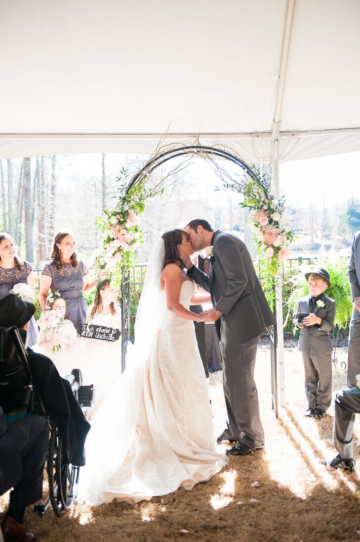 The couple decided on a tented garden ceremony, and Jim's extended family all chipped in and surprised them with their venue as a wedding gift.