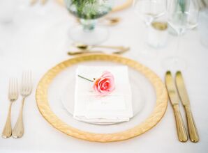 Gold-Rimmed Dinnerware and Brass Cutlery
