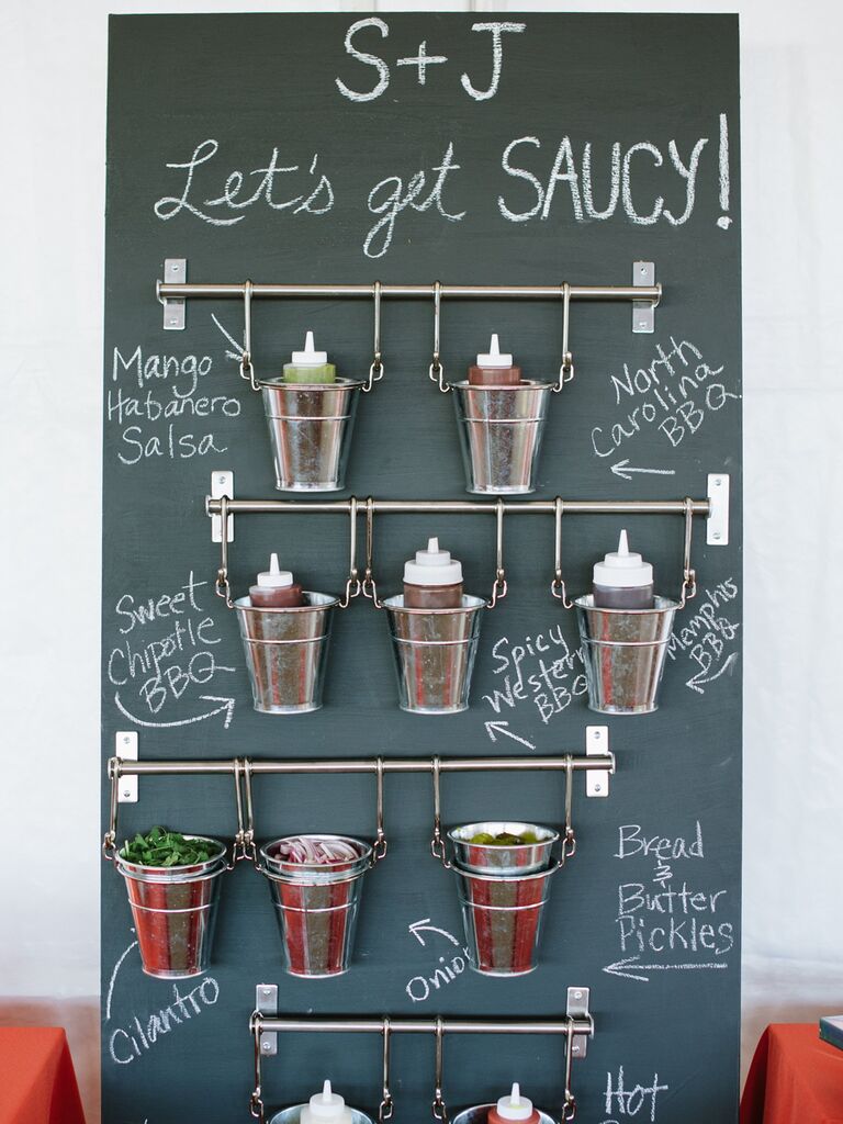 Southern wedding food idea with a BBQ sauce station