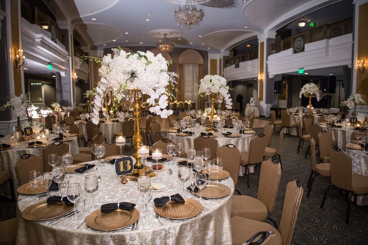 The varying centerpieces were all white with roses, David Austin roses, anemone flowers and hydrangea.  The centerpieces could be seen in both a low and high version.