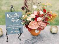 'Kindly Sign' and details in cursive type on slate-colored background