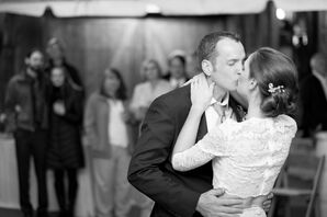 Bride and Groom Kiss During First Dance