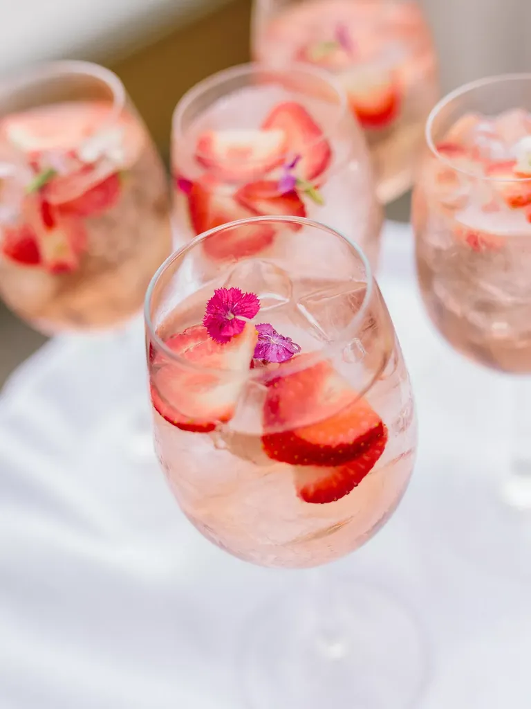 Strawberry rose punch for big batch signature wedding drink idea