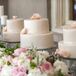 Following a dinner of miso-glazed mahi mahi and grilled pepper-crusted sirloin, guests were treated to their choice of wedding cakes. Something Sweet by Michelle whipped up three two-tier confections, each boasting a different flavor: pumpkin brown butter with caramel buttercream, chocolate ganache and coconut cream cake with passion-fruit mousse.