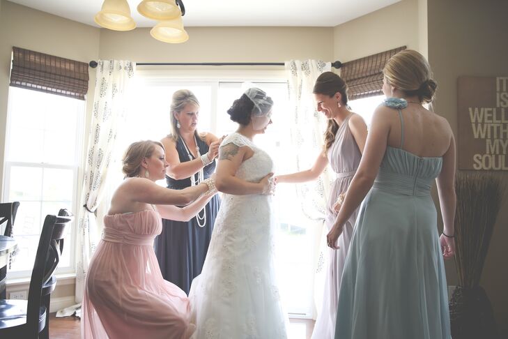 Bride Getting Ready in Vintage Lace Cap-Sleeve Wedding Dress and Blusher Veil