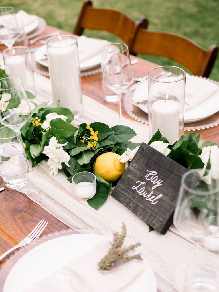 Lemon leaves citrus wedding table arrangements 
