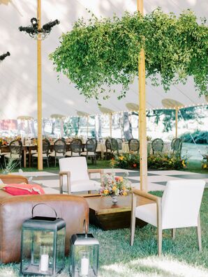 Lounge Space at Tented Reception Near Dance Floor Under Greenery Chandelier